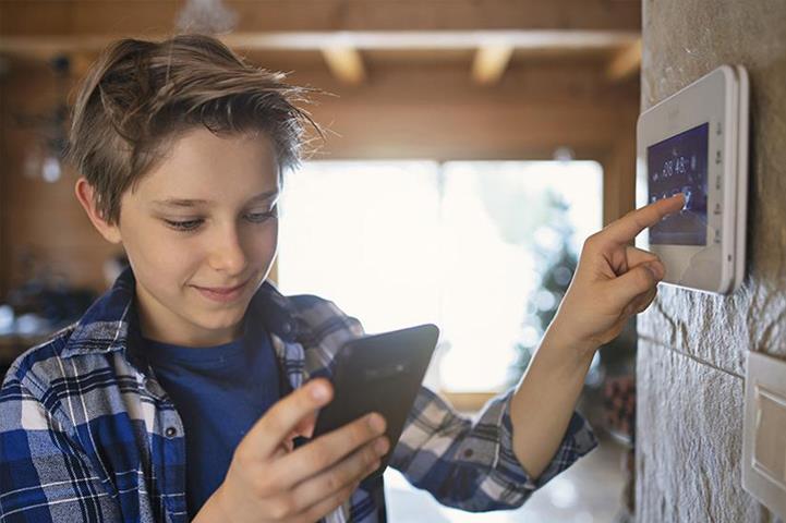 Child using thermostat