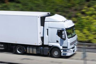 18 wheeler truck driving on a road