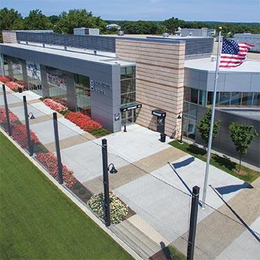 View of a building with an American flag on a pole